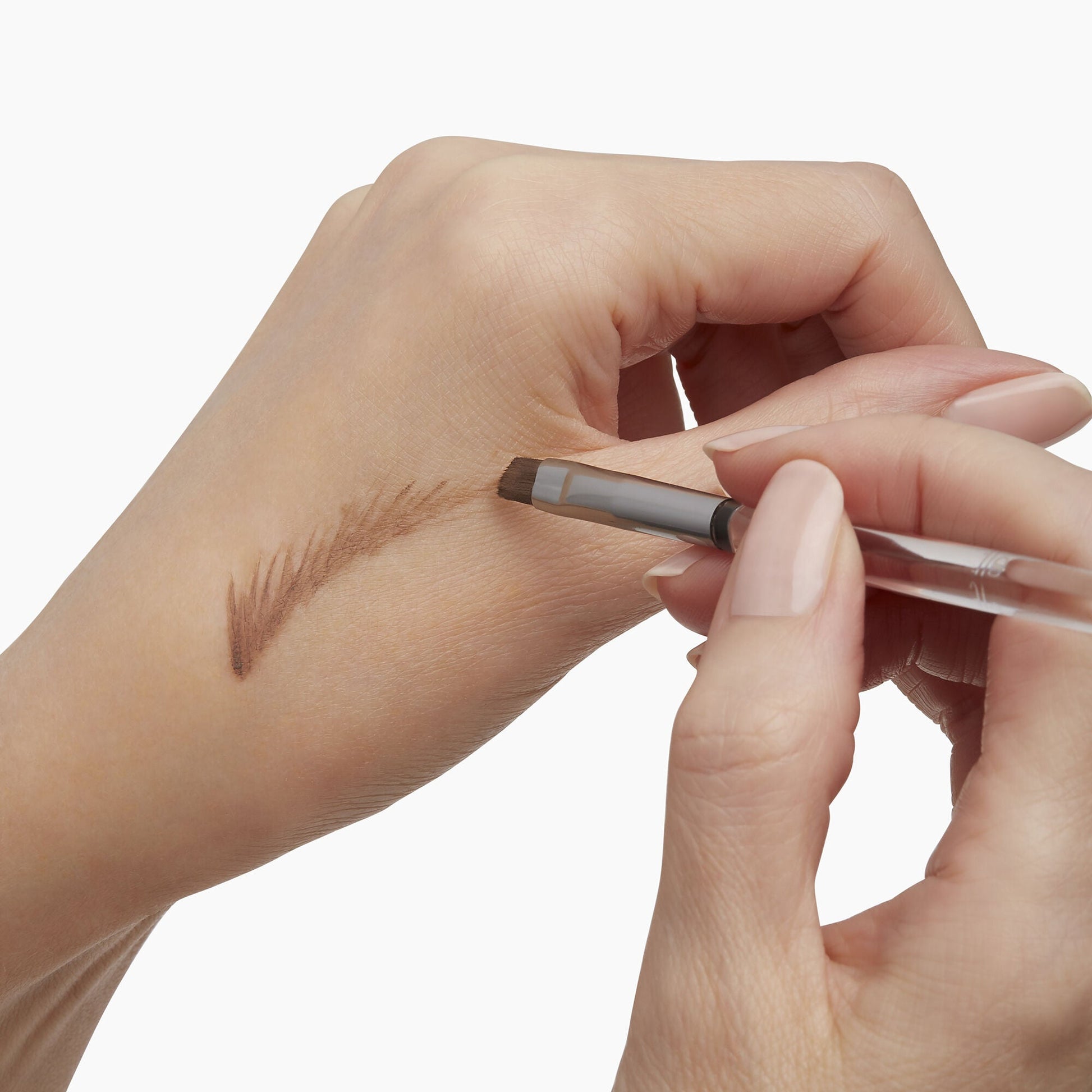 precision-dual-sided-eyebrow-brush-y7 85315_PrecisionDualSidedEyebrowBrush_Model_V2.jpg